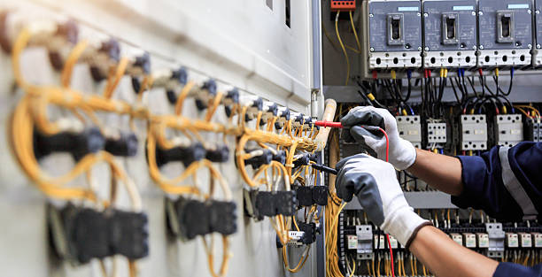 Professional Electrician technician working in Greilickville, MI